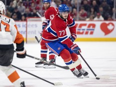 Canadiens forward Kirby Dach makes a backhand pass during third period against the Philadelphia Flyers in Montreal on Nov. 4, 2025.