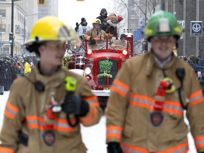 Firefighters walk in front of a 1946 fire truck during the St. Patrick’s Parade in Montreal on Sunday, March 22, 2026. Firefighters walk in front of a 1946 fire truck during the St. Patrick’s Parade in Montreal on Sunday, March 22, 2026.