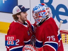 Canadiens' Jacob Fowler, left, congratulates Jakub Dobes after a victory over the Chicago Blackhawks in Montreal on Dec. 18, 2025.