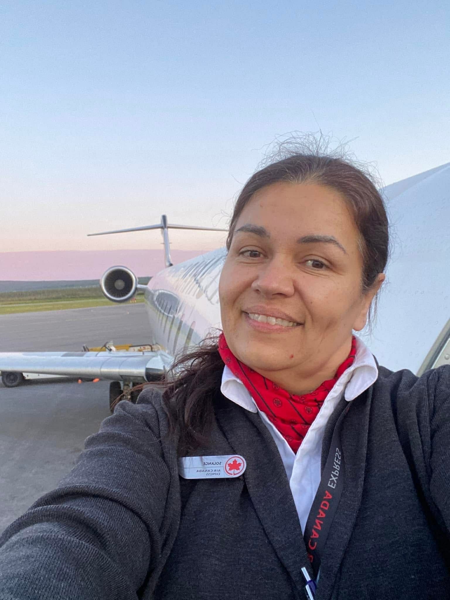Selfie taken by a flight attendant as she boards a plane