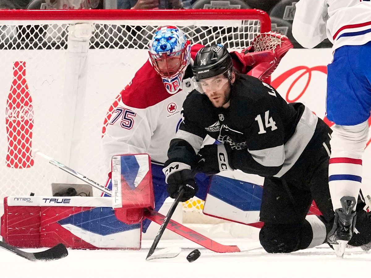 Hockey goaltender keeps a watchful eye on the action,