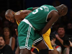 Kobe Bryant (L) of the Los Angeles Lakers and Kevin Garnett of the Boston Celtics battle for the ball in Game Four of the 2008 NBA Finals on June 12, 2008 at Staples Center in Los Angeles.