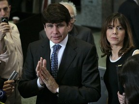 Former Illinois Governor Rod Blagojevich with his wife Patty before opening statements were heard on June 8.