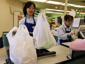 By 2013, the number of plastic bags in Alberta would be reduced by about half the 900 million used in 2008.