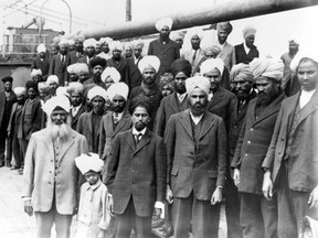 Archival photo of some of the 376 Punjabis, mostly Sikhs, aboard the Komagata Maru in Vancouver Harbor in 1914.