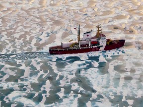 The Canadian coast guard icebreaker Henry Larsen sails through the Northwest Passage in 2009.