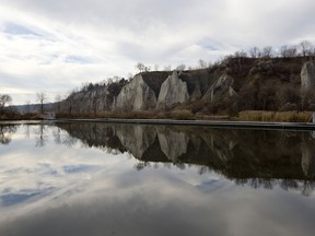 A view of the Scarborough Bluffs reflected in a pond at Bluffers Park in Scarborough, Ontario.