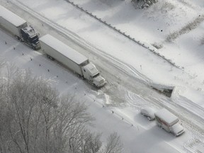 Police say traffic on some eastbound lanes of Highway 402 is now moving after a massive snowstorm trapped more than 300 vehicles for two days.