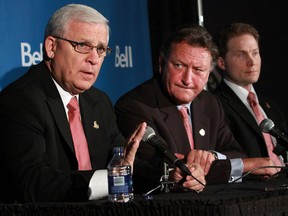 (L-R) Ottawa Senators general manager Bryan Murray, owner Eugene Melnyk and head coach Cory Clouston.