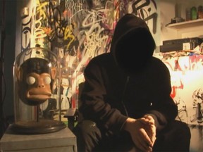 At right: Banksy. At left: Banksy's monkey mask, which will not be seen on the Oscars telecast. Or will it?