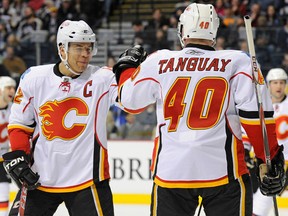 Jarome Iginla and Alex Tanguay of the Calgary Flames celebrate after a goal against the Nashville Predatorson February 1, 2011 at the Bridgestone Arena in Nashville, Tennessee.
