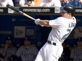 Toronto Blue Jays' Adam Lind hits a two run walk-off home run in the ninth inning to beat the Tampa Bay Rays in their American League MLB baseball game in Toronto September 12, 2010.