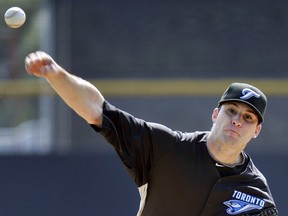 Toronto Blue Jays pitcher Brandon Morrow throws during an inter-squad game at their MLB American League spring training facility in Dunedin, Florida, February 25, 2011.