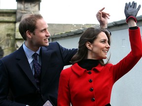 Prince William (L) and his fiancee Kate Middleton wave as they pass St Salvator's halls during a visit to the University of St Andrews in Scotland on February 25, 2011. During the visit they viewed the surviving Papal Bull (the university's founding document), unveiled a plaque, and met a selection of the University s current staff and students to mark the start of the Anniversary. Prince William and Kate Middleton attended the university as students from 2001 to 2005 and began their romance in St Andrews.