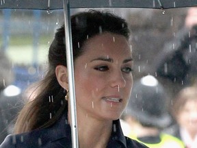 DARWEN, ENGLAND - APRIL 11: Kate Middleton and Prince William arrive at Darwen Aldridge Community Academy on April 11, 2011 in Darwen, England.