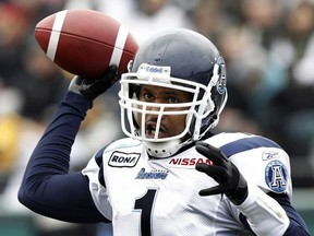 Toronto Argonauts quarterback Cleo Lemon throws a pass against the Hamilton Tiger-Cats during the first half of their CFL eastern semi-final football game in Hamilton November 14, 2010.