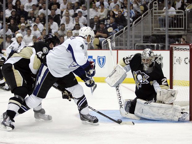 Martin St. Louis deflects it in past Fleury 