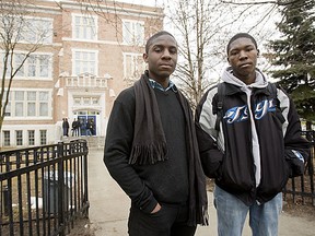 Brothers James Wilson, Grade 12, right, and José Wilson, Grade 11, left, disagree on Africentric schools. James is for and José is against.