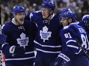 Defenceman Luke Schenn (L), prospect Keith Aulie (C) and forward Phil Kessel should all help the Toronto Maple Leafs improve over the next few years.