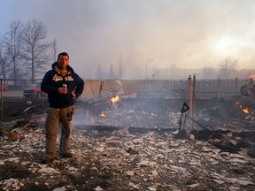 The wildfires destroyed Shane O’Brien’s new home. On Sunday, he snuck past the police barricades to visit the site where his house used to be. “The only thing that was left was a sprocket from my motorcycle,” he said.