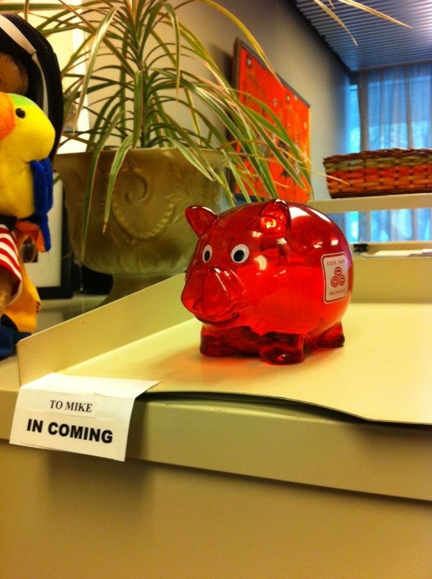 Budget Chief Mike Del Grande's piggy bank is back home. Someone swiped it from the council chambers on Wednesday.
