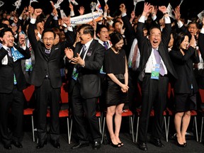 South Korea's president Lee Myung Bak (2nd L) reacts as Pyeongchang is chosen as the host city for the 2018 Olympic Winter Games.