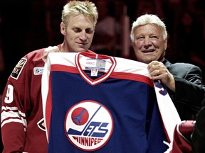 Former Winnipeg Jet Brett Hull (R) had his No. 9 retired by the Phoenix Coyotes, for whom his son Brett (L) played in 2005.