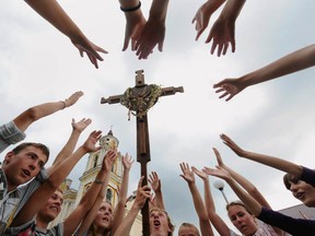 Belarusian Catholics attend a procession during the annual Icon of the Mother of God celebration in Budslav, some 150 km north from Minsk  on July1, 2011.      AFP PHOTO / VIKTOR DRACHEV (Photo credit should read VIKTOR DRACHEV/AFP/Getty Images)