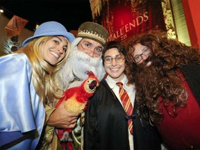 Moviegoers, some sporting Potter-inspired costumes, lined up at theatres for the first showings and events coordinated with the debut of Deathly Hallows: Part 2.