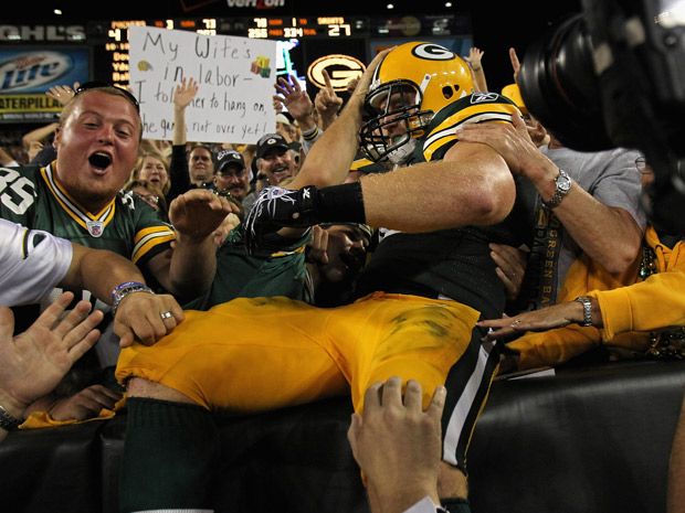 Photo: Green Bay Packers Donald Driver reacts with John Kuhn at