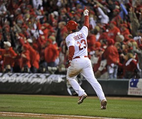 David Freese of the St. Louis Cardinals hits a walk off solo home