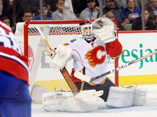 Calgary Flames goalie Miikka Kiprusoff takes a breather during