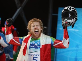 Canadian skeleton athlete Jon Montgomery celebrates his gold medal performance at the 2010 Olympics.