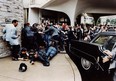 Police and Secret Service agents react moments after former U.S. President Ronald Reagan was shot by John Hinckley Jr. outside the Washington Hilton, Mar. 30, 1981.