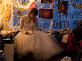 RNPS IMAGES OF THE YEAR 2011 - Eveline Constance Heijkamp, a 22-year-old Occupy Amsterdam demonstrator, prepares for her wedding to Gijs Peskens inside a tent on the Beursplein in Amsterdam November 19, 2011. REUTERS/Cris Toala Olivares (NETHERLANDS - Tags: SOCIETY POLITICS CIVIL UNREST BUSINESS)