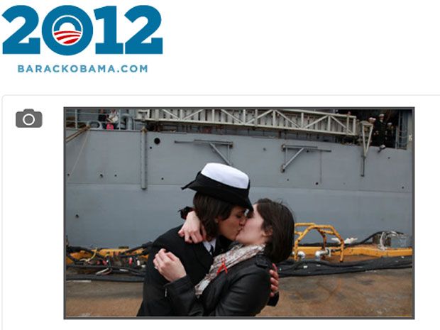 Traditional first kiss upon return of USS Oak Hill exchanged between two  lesbian sailors 