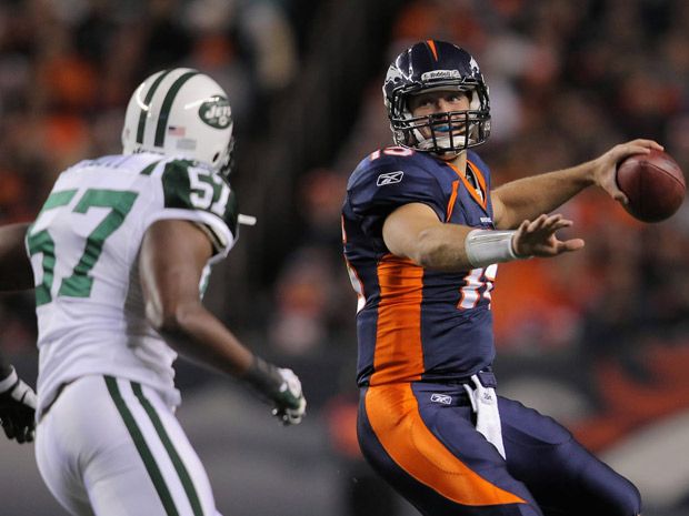 Brady, Patriots slow down Tebow, Broncos to clinch AFC East title