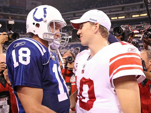 Eli Manning looks far from impressed as brother Peyton wins Super