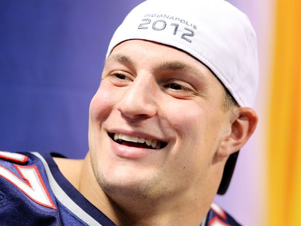 New England Patriots tight end Ron Gronkowski arrives on the field for  media day prior to Super Bowl XLVI in Indianapolis on January 31, 2012.  This is Gronkowski's first day without wearing