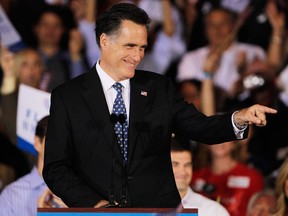 Republican presidential hopeful, former Massachusetts Gov. Mitt Romney gestures during his Florida primary night party on January 31, 2012 in Tampa, Florida. According to early results Romney defeated former Speaker of the House Newt Gingrich, former U.S. Sen. Rick Santorum and U.S. Rep. Ron Paul (R-TX) to win Florida's primary