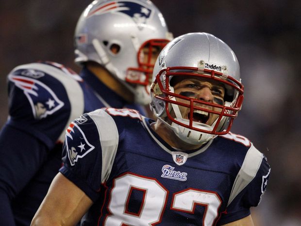 Wes Welker wearing enormous helmet for playoff game