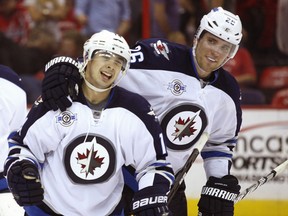 Time Stapleton capped a comeback for the Winnipeg Jets with a goal in overtime as they rallied from three goals down and kept themselves in the playoff hunt.