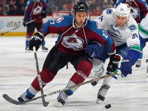 In 24 American Hockey League games with the Chicago Wolves, before and after his earlier stint with the Vancouver Canucks, Byron Bitz, right, had nine points.