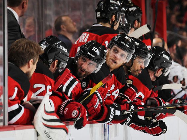 New Jersey Devils' Patrick Elias takes a break during a team