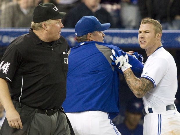 Toronto Blue Jays' Brett Lawrie keeps an eye on his hands