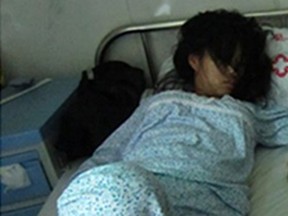 Feng Jianmei, 23, was beaten by officials and forced to abort the baby at seven months on June 2 because her family could not afford a 40,000 yuan (US$6,300) fine for having a second child, Chinese media reported. This is a cropped version of the graphic photo of Feng that sparked widespread outrage.
