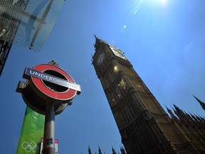 An underground sign is pictured next to the "Big Ben" clock Tower on July 24, 2012, in London three days before the start of the London 2012 Olympic Games. Seven years in the making, costing £9.3 billion ($14.5 billion) and featuring 10,490 athletes, the London Olympics opens on July 27 with 302 gold medals to be won and hard-fought reputations at stake. AFP PHOTO / JOHANNES EISELEJOHANNES EISELE/AFP/GettyImages