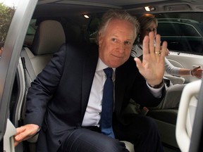 Quebec Liberal Party leader Jean Charest leaves the polling station after casting his ballot in his riding in Sherbrooke, Que., Tuesday, September 4, 2012 as Quebecers vote in a provincial election .THE CANADIAN PRESS/Ryan Remiorz