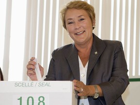 Ms. 34%: Parti Quebecois Leader Pauline Marois casts her ballot in Beaupre, Que., on Tuesday, September 4, 2012.