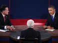 BOCA RATON, FL - OCTOBER 22:  U.S. President Barack Obama (R) debates with Republican presidential candidate Mitt Romney at the Keith C. and Elaine Johnson Wold Performing Arts Center at Lynn University on October 22, 2012 in Boca Raton, Florida. The focus for the final presidential debate before Election Day on November 6 is foreign policy.  (Photo by Win McNamee/Getty Images)